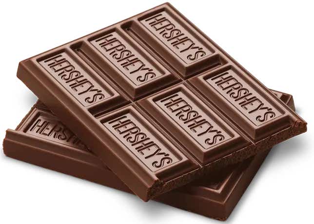 stack of unwrapped hersheys milk chocolate candy bars